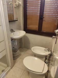 Koupelna v ubytování Hotel Salus