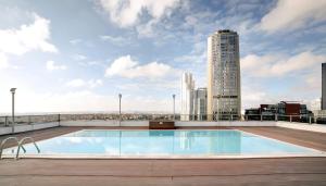 a swimming pool on the roof of a building at Luxury Residence in Şişli (Pool/Garage/Gym) in Istanbul