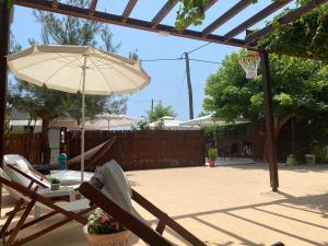 A garden outside Plaisir Rooms