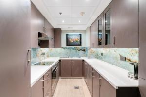 Kuchyň nebo kuchyňský kout v ubytování LUXFolio Retreats - Experience Luxury Living