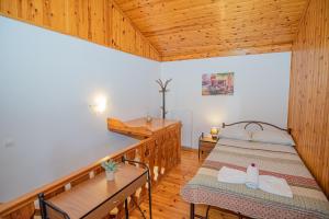 A bed or beds in a room at Natasa's cozy house