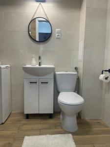 Koupelna v ubytování Apartament Centrum