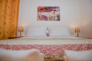 A bed or beds in a room at Natasa's cozy house