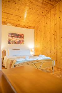 A bed or beds in a room at Natasa's cozy house