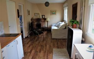 Posezení v ubytování La casina del hórreo