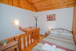 A bed or beds in a room at Natasa's cozy house