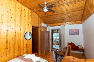 A bed or beds in a room at Natasa's cozy house