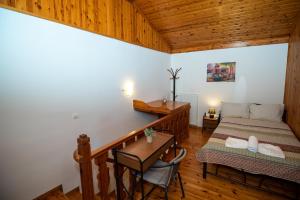 A bed or beds in a room at Natasa's cozy house