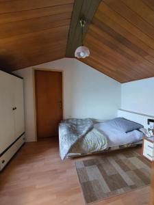 Postel nebo postele na pokoji v ubytování Apartment Dvorac