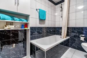 Ένα μπάνιο στο Comfort apartments in peaceful area Zadar - with garden +46 φωτογραφίες
