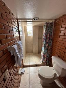 Um banheiro em Hotel Villa Del Rey
