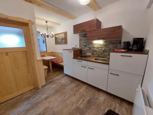 Kuchyň nebo kuchyňský kout v ubytování Ferienwohnung Almsuite Fritz + 13 fotografií
