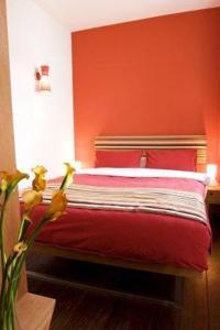 Llit o llits en una habitació de Prinsenhuis