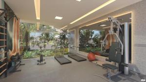 una sala fitness con tapis roulant di Mana Beach Flat Prime a Ipojuca