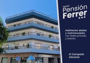 a building with a sign in front of it at Ferrer in El Campello