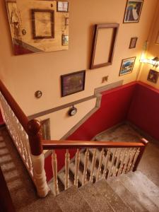 Televízia a/alebo spoločenská miestnosť v ubytovaní 1920s Rooms