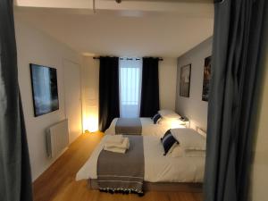 Katil atau katil-katil dalam bilik di La Timonerie- Vue mer/Plage/Port