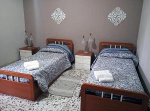 Кровать или кровати в номере B&b Vista Etna +26 фотографий