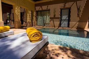 Πισίνα στο ή κοντά στο Palais Mirage d'Atlas, Hôtel de Luxe & Spa