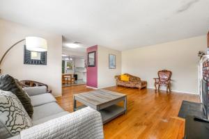 a living room with a couch and a table at Westside Beauty in Santa Cruz