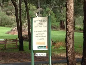 a sign that is on top of a pole at Beyonderup Falls Adult Retreat in Nannup