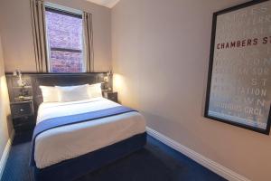 Postel nebo postele na pokoji v ubytování The Frederick Hotel Tribeca