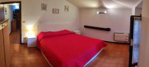 Un pat sau paturi într-o cameră la IL VICOLETTO