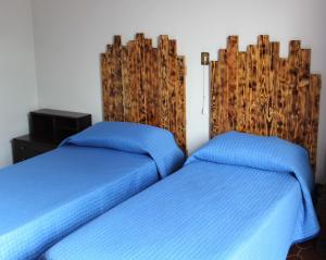 A bed or beds in a room at Villa Magnolia