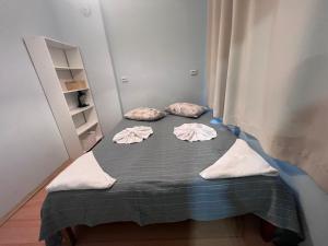 A bed or beds in a room at Apartment Saborni