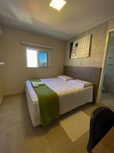 Postel nebo postele na pokoji v ubytování Hotel Imperatriz