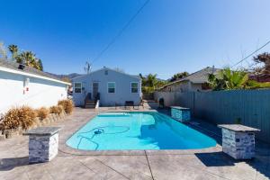 a swimming pool in the backyard of a house at San Fernando Pool home + Large Private Guest House in San Fernando