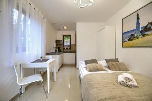 Postel nebo postele na pokoji v ubytování Haus Claudia