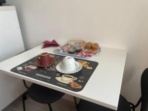 Coffee and tea making facilities at Appartamento Le Risaie