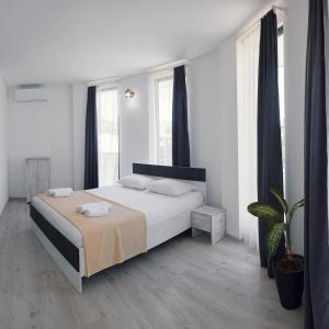 Letto o letti in una camera di Hotel General Tso Kobuleti
