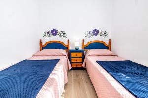 Posteľ alebo postele v izbe v ubytovaní Chalet Marinera Riumar Pura Natura