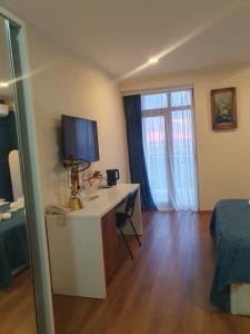 TV o dispositivi per l'intrattenimento presso The Fresh Wave hotel