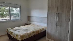 Ліжко або ліжка в номері Apartamento Areias Brancas - 202