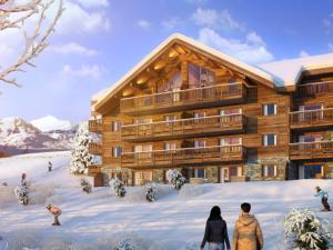 eine Skihütte im Schnee in der Unterkunft Appartement luxueux aux pieds des pistes avec parking couvert - FR-1-416-184 in La Toussuire