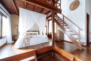 Voodi või voodid majutusasutuse Vila Dos Orixás Boutique Hotel toas +123 fotot