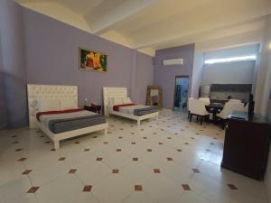 Posezení v ubytování Amplio Estudio en Cozumel, Condominio privado E12