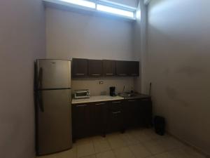 Kuchyň nebo kuchyňský kout v ubytování Amplio Estudio en Cozumel, Condominio privado E12 + 8 fotografií