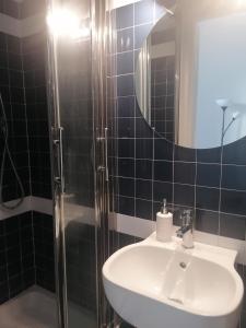 A bathroom at Vatican Walls Apartment