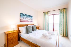 Postel nebo postele na pokoji v ubytování Frente ao Mar - Sea Front - 3 Quartos - wi-fi - Algarve