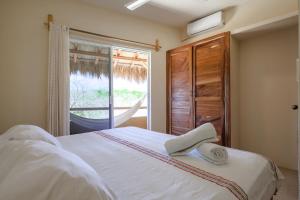 Кровать или кровати в номере Bonobo Living Apartments