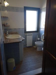 Ένα μπάνιο στο Casa vacanza S'ulivàriu - Posada