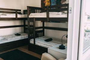 Voodi või voodid majutusasutuse Smart hostel toas