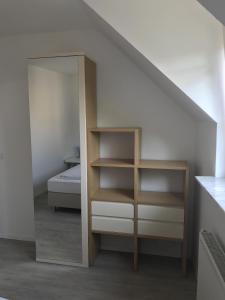 Ένα ή περισσότερα κρεβάτια σε δωμάτιο στο Landhaus Kirsch +1 φωτογραφίες
