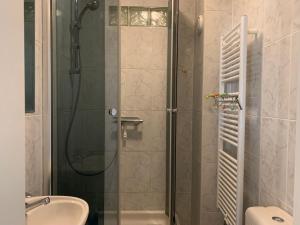 a bathroom with a shower and a sink at Large Room Free Parking 10mins to Luxembourg Airport Excellent Customer Service in Luxembourg