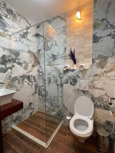 Koupelna v ubytování Apartments Miri + 37 fotografií