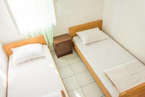 Ένα ή περισσότερα κρεβάτια σε δωμάτιο στο Secluded fisherman's cottage Cove Zizanj, Pasman - 21004